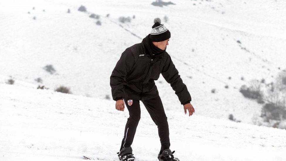 Snowboarding on the South Downs at Devil's Dyke near Brighton.