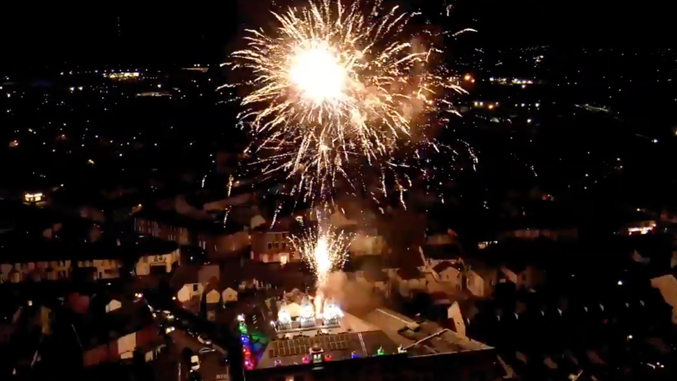 Diwali fireworks above the lit-up Shri Swaminarayan Temple in Cardiff