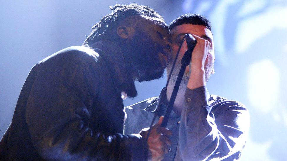 Young fathers on stage