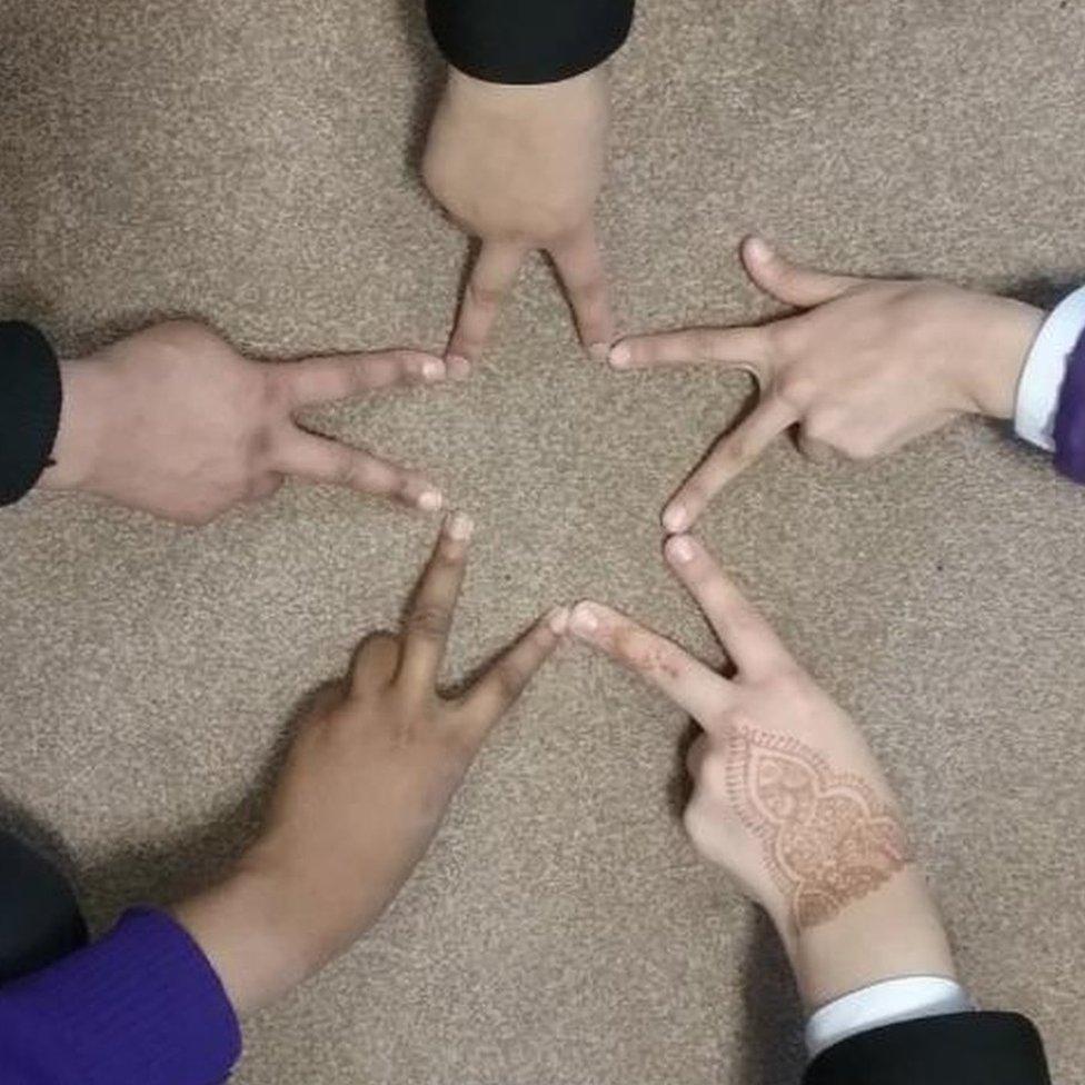 Different fingers joined together to show a star shape