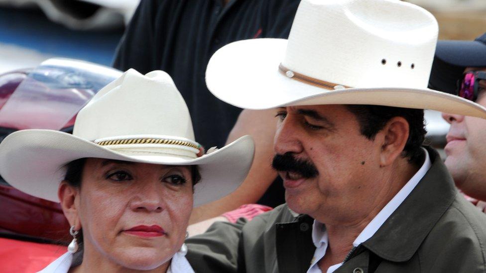 Honduran presidential candidate for the Libertad y Refundacion (LIBRE) party, Xiomara Castro (L), and her husband, former Honduran President (2006-2009) lead a protest against the results of the presidential election in Tegucigalpa, on December 1, 2013