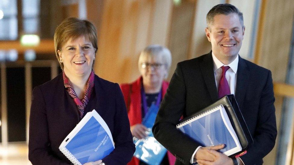 Nicola Sturgeon and Derek Mackay