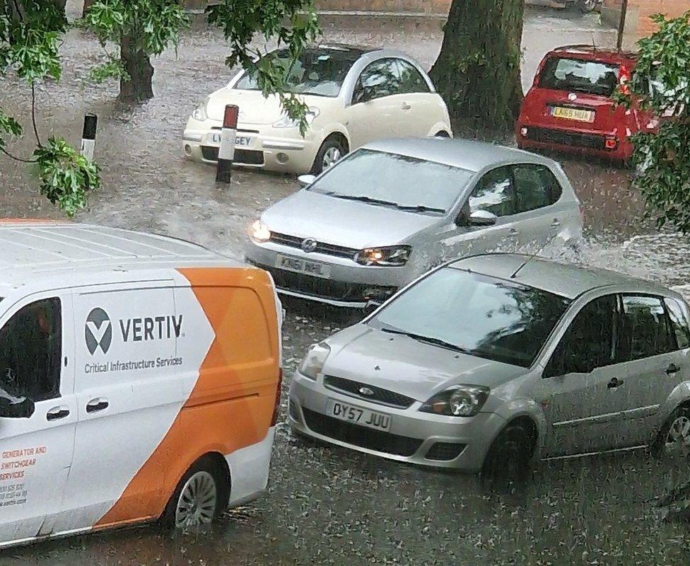 Water around cars in De Parys Avenue, Bedford