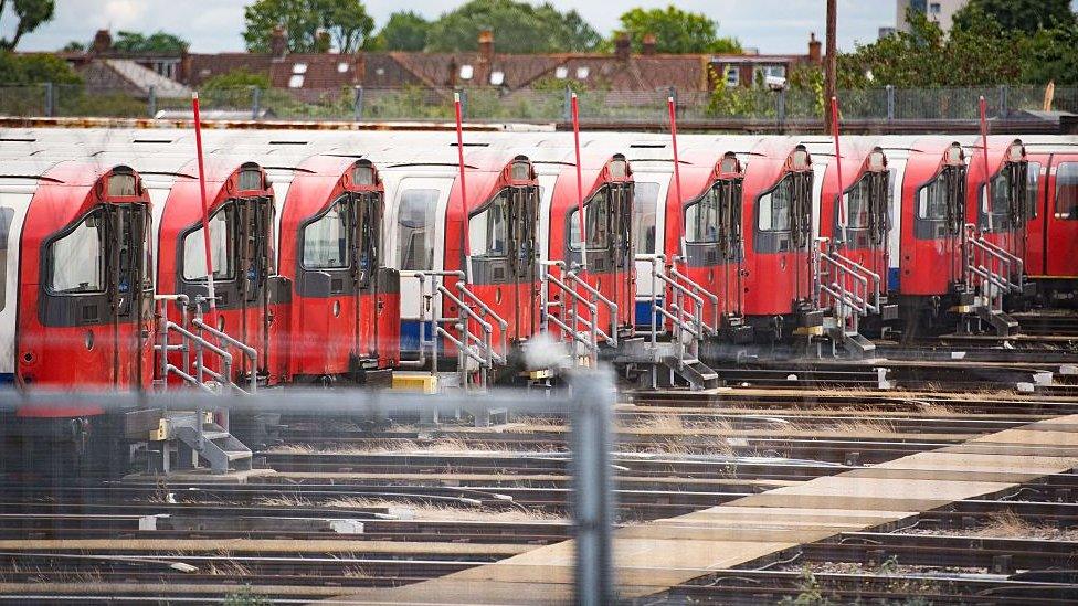 London Underground Piccadilly Line tube trains are parked at the Northfields Depot