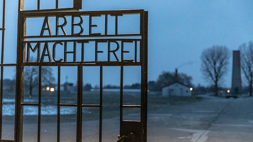 A gate with the inscription Work Sets You Free at the Sachsenhausen concentration camp