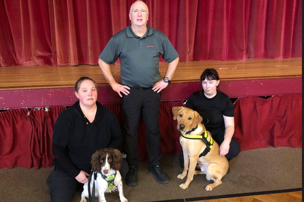 Debra Salata with Delta, a springer spaniel, Phil Bowyer and Kirsty Armstrong with Chance