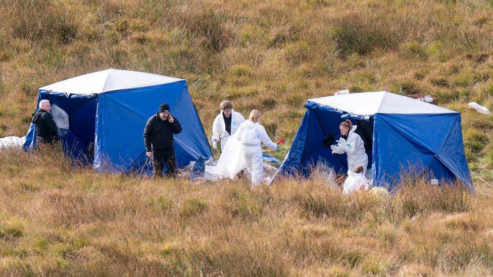 Police experts conducting a search of Saddleworth Moor for the remains of Keith Bennett
