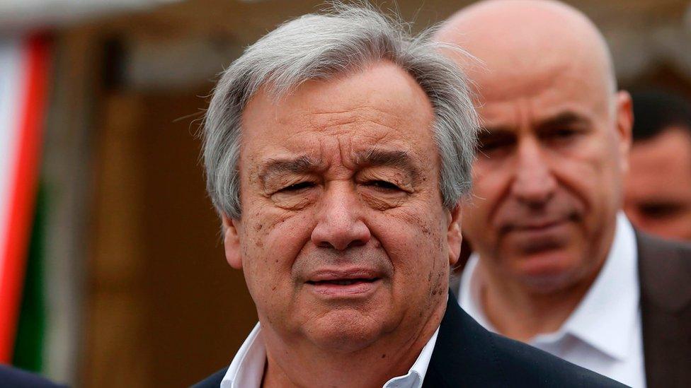 UN Secretary-General Antonio Guterres (C) delivers a speech during his visit to the Hasan Sham Camp, for Iraqis displaced by fighting with jihadists, on March 31, 2017,