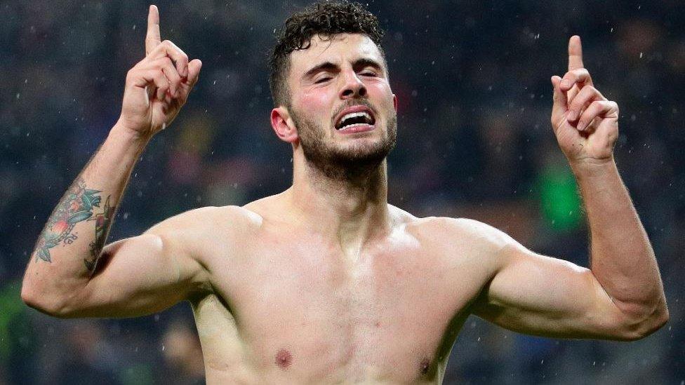 Patrick Cutrone celebrates scoring for AC Milan