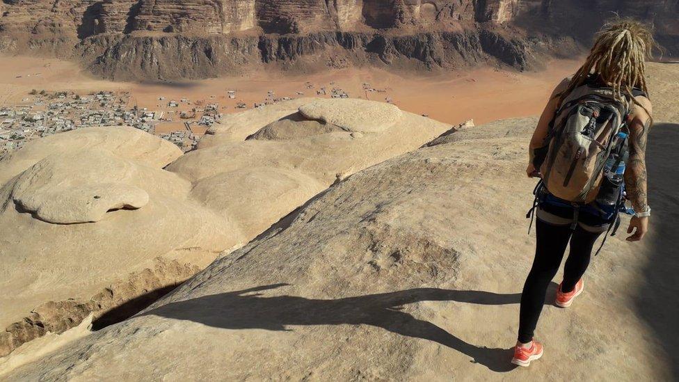 Tara coming down from the summit of Jebel Rum in the Wadi Rum desert in Jordan