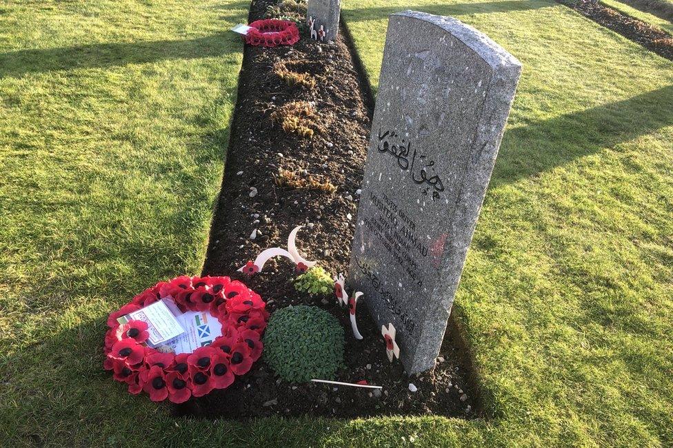 Wreaths laid on graves