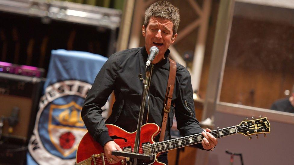 Noel Gallagher performing with his band High Flying Birds