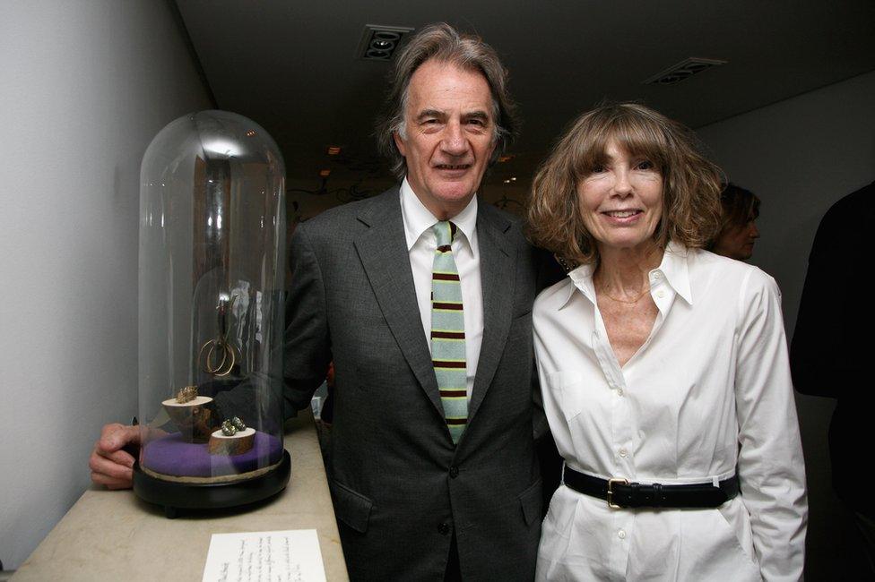 Paul Smith and wife Pauline pose beside one of the exhibits on display in the 'My Most Treasured...' exhibition at Browns during the Private View on June 9, 2008 in London, England