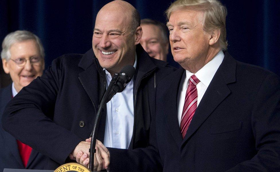 US President Donald Trump shakes hands with Gary Cohn, Director of the National Economic Council, on January 6, 2018