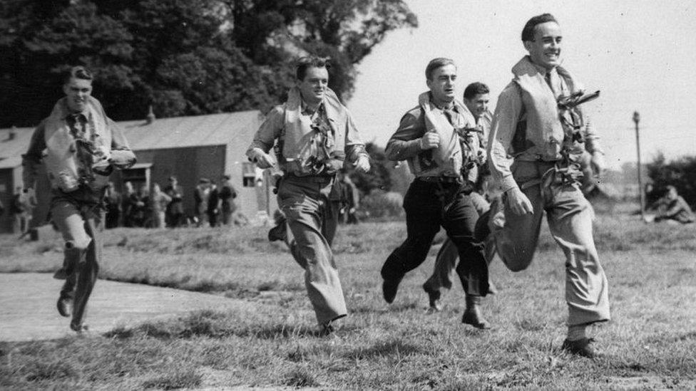 Pilots running on a scramble