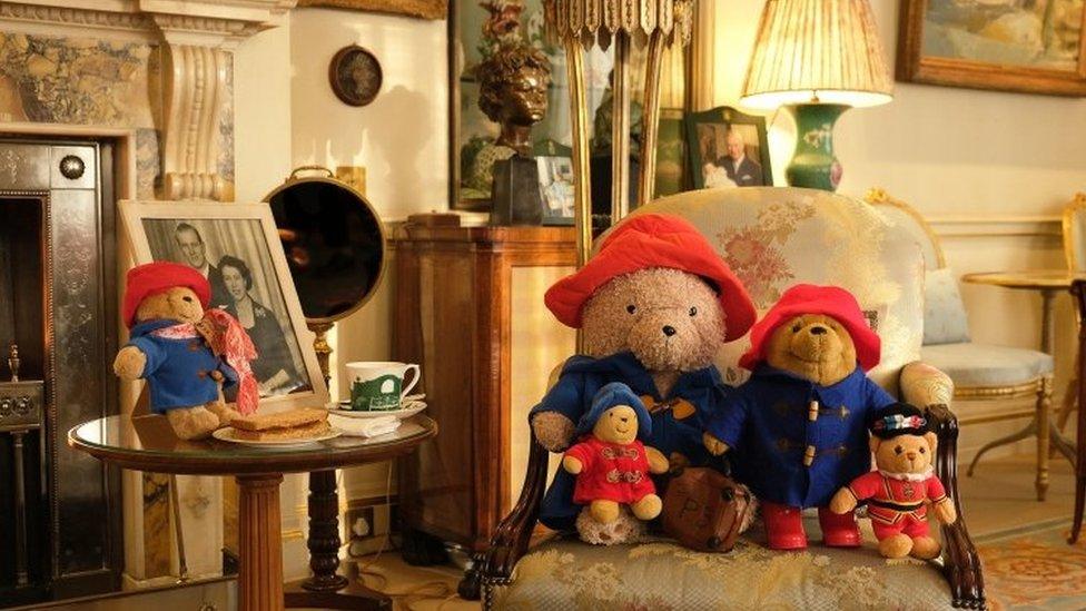 Paddington Bear toys with a cup of tea and a marmalade sandwich in the Morning Room at Clarence House in London