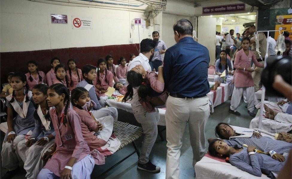 Indian schoolgirls receive medical treatment at a government hospital after gas leak in Tughlakabad, New Delhi on 6 May, 2017.