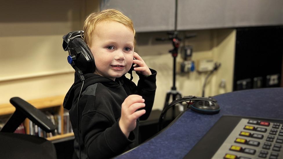 Jesse, 4, in a radio studio