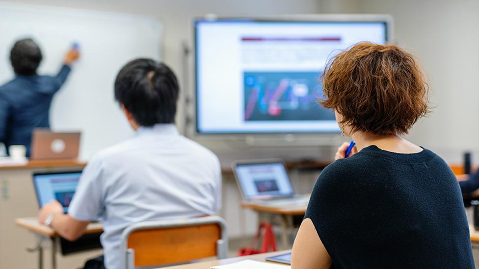 University students in seminar room