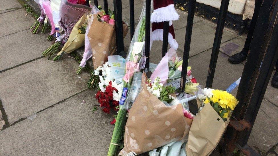 Floral tributes at scene Pic: Yana Thandrayen