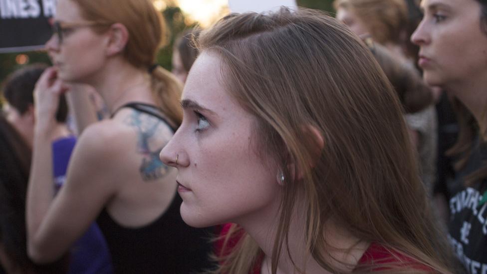 Woman outside the Supreme Court, to oppose Judge Kavanaugh's nomination