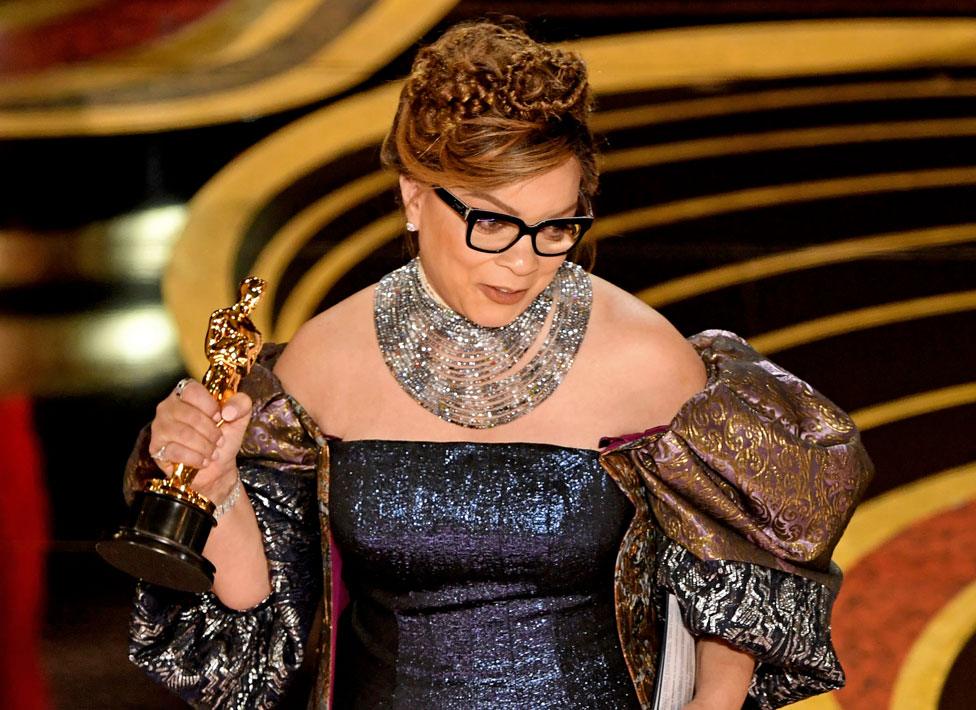 Ruth Carter accepts her Oscar