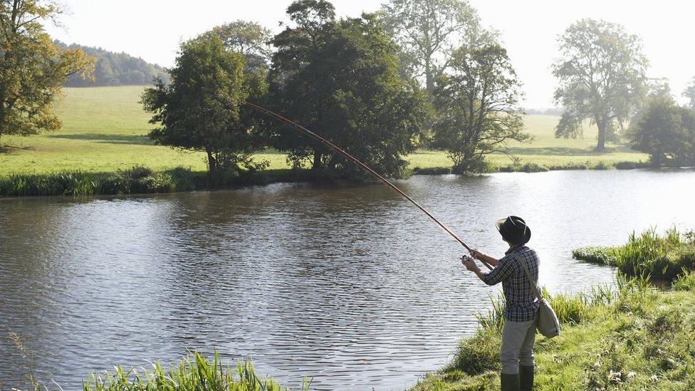 Stock image of a fisherman