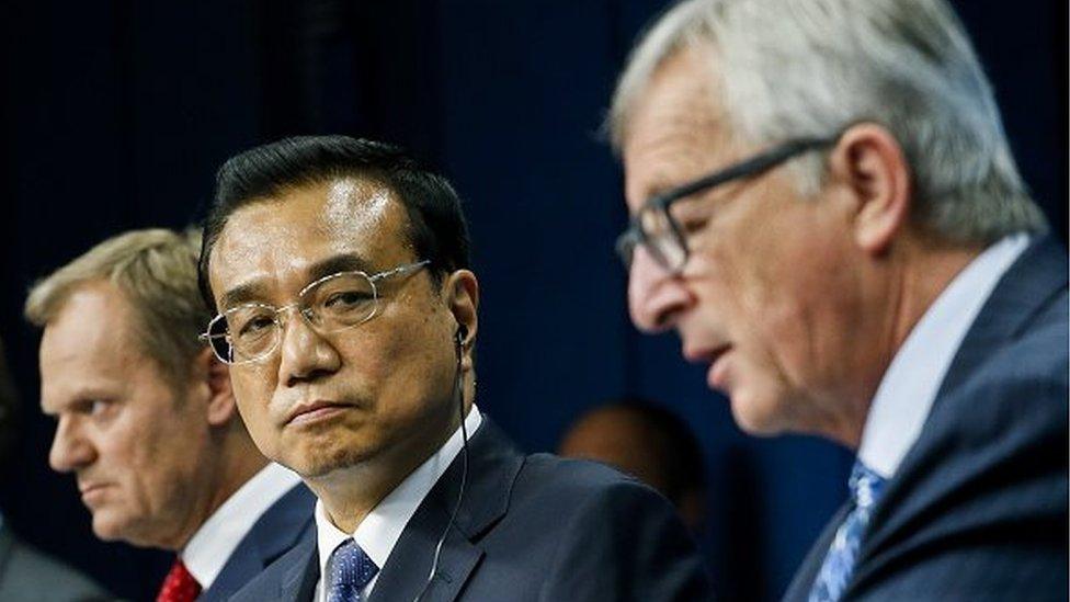 European council president Donald Tusk, Chinese Prime Minister Li Keqiang and European Commision President Jean-Claude Juncker give a press conference after the 17th bilateral EU-China summit at the EU Council headquarters in Brussels on June 29, 2015.