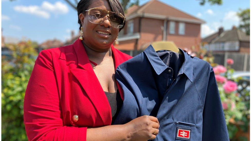 BBC Radio Manchester presenter Simone Riley with her late grandad's train driver shirt