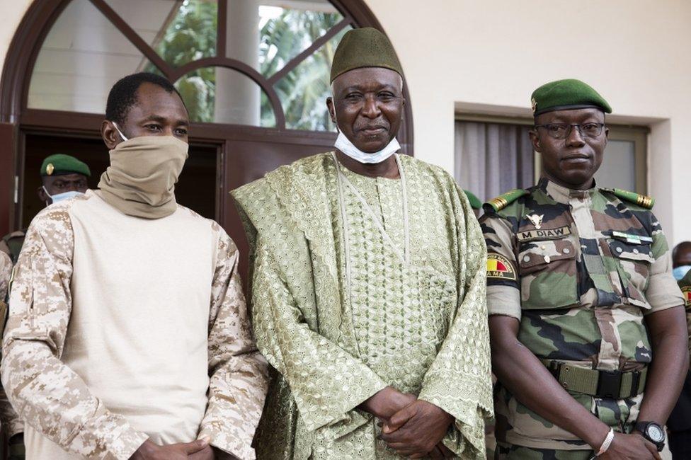 Mali junta leader and new transition vice president Colonel Assimi Goita (L) with the new transition president former defence minister Bah Ndaw (C) and Colonel Malick Diaw (R) of the National Committee for the Salvation of the People (CNSP) pose for a photograph during a meeting with Economic Community Of West Africa (ECOWAS) in Bamako, Mali, 24 September 2020. The 70-year-old Bah Ndaw who had been retired was appointed transition president by a committee chosen by the junta.