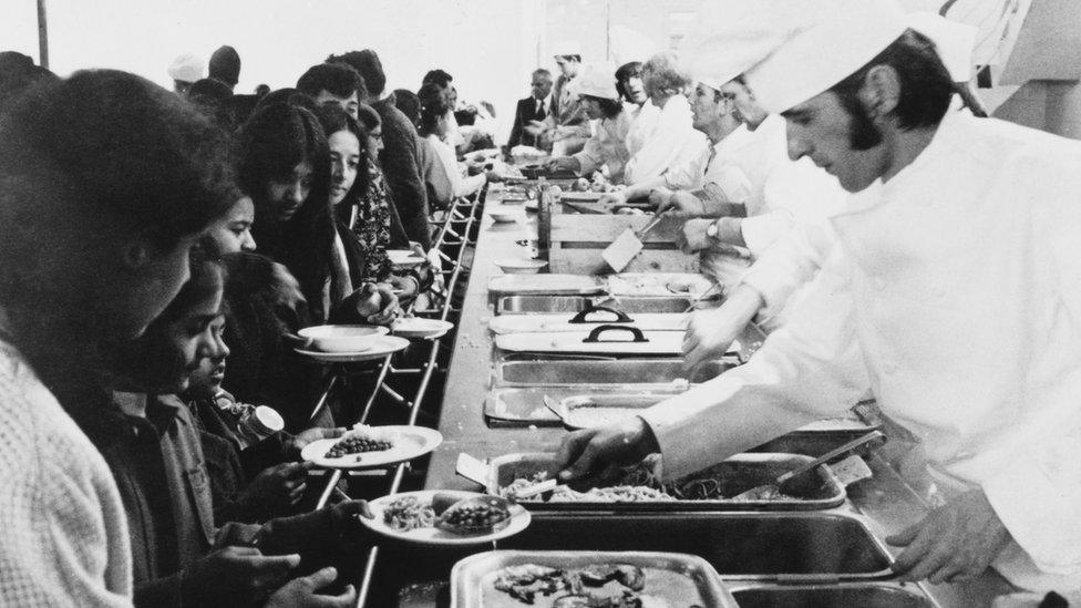 Ugandan Asians being served food at Stradishall camp in 1972