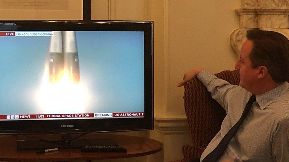 David Cameron watching a space launch on TV