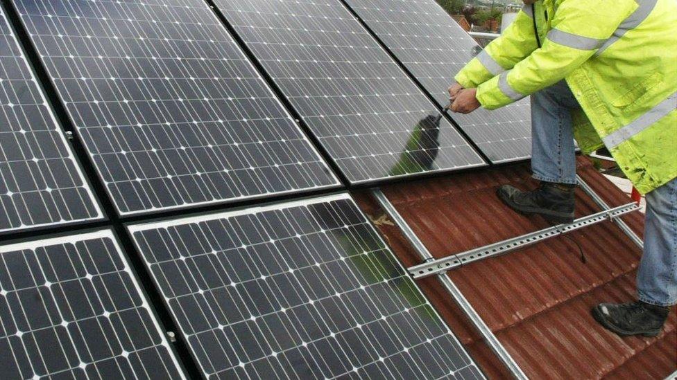 Solar panels being installed