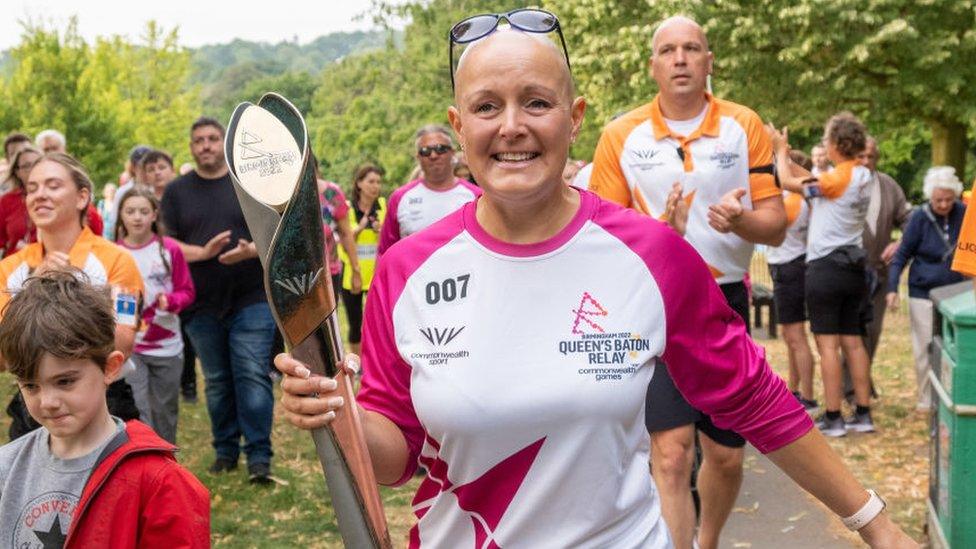 Victoria Bateman takes part in The Queen's Baton Relay as it visits Uttoxeter as part of the Birmingham 2022 Queens Baton Relay on July 20, 2022 in Uttoxeter