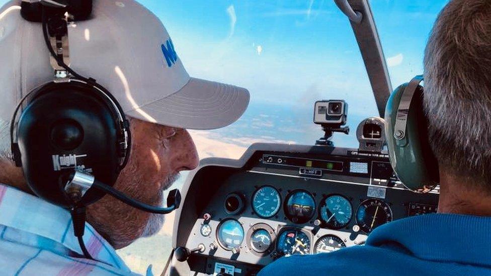 Mr Hemmings taking control of the aircraft