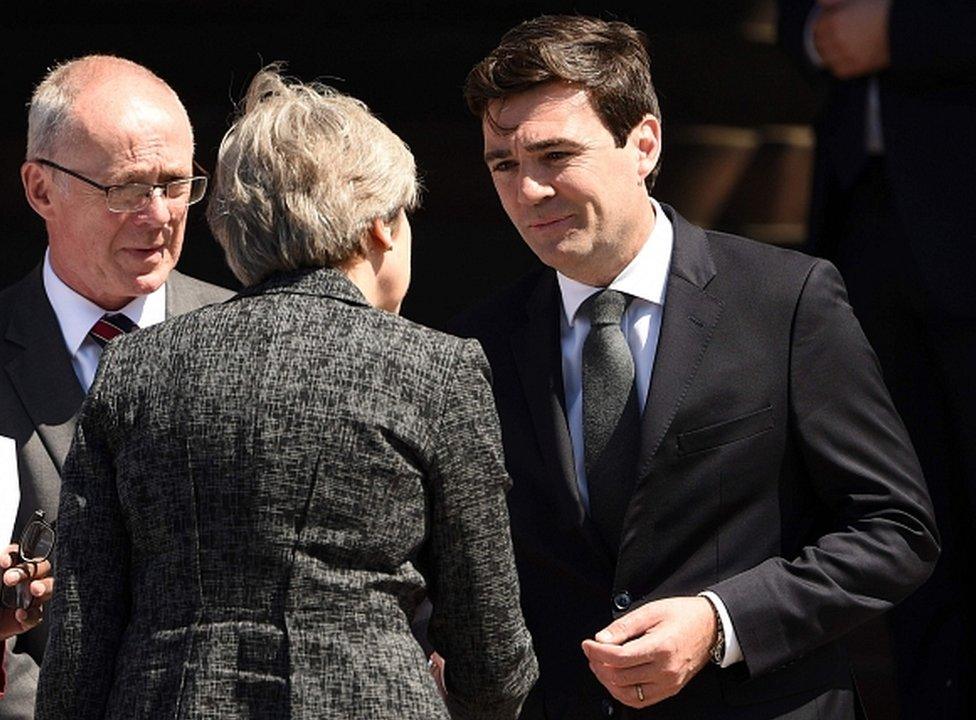 Andy Burnham talking to Theresa May