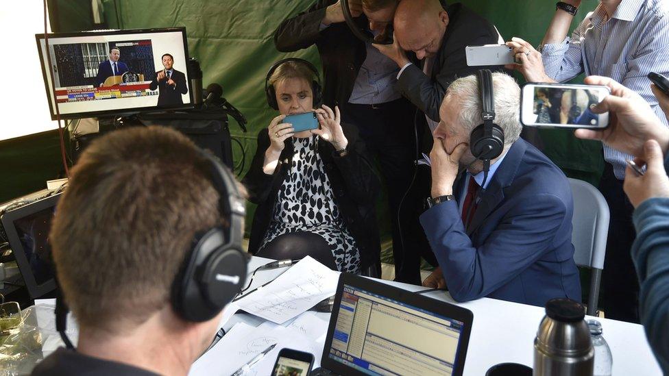 Jeremy Corbyn, the leader of the opposition Labour Party, watches Prime Minister David Cameron on a screen as he speaks outside 10 Downing Street after Britain voted to leave on the European Union in London, Britain, June 24, 2016.