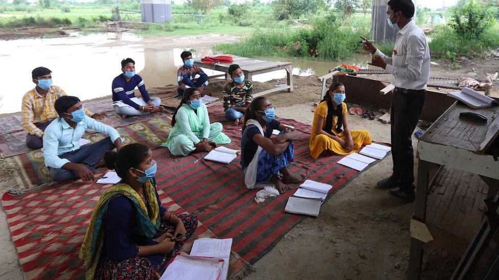 Classes take place with masks and social distancing during school closures