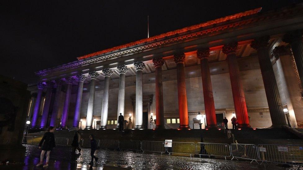 St George's Hall in Liverpool illuminated in blue, white and red