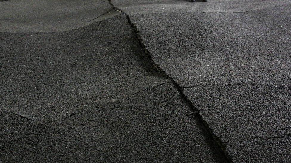 Broken pavement is seen after the quake in Kumamoto, Japan (16 April 2016)