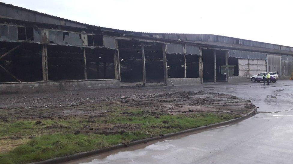 The remains of a recycling centre fire