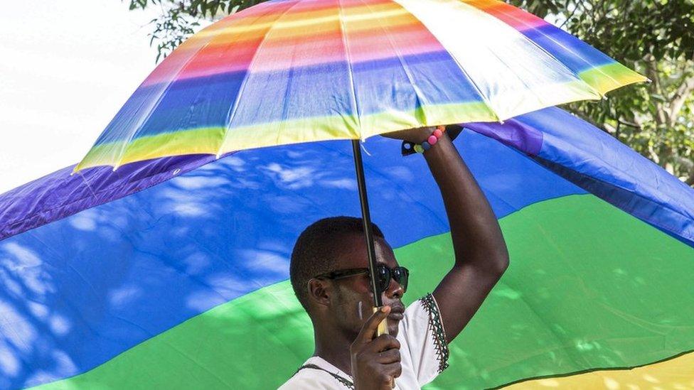 A man at a gay pride rally in Uganda