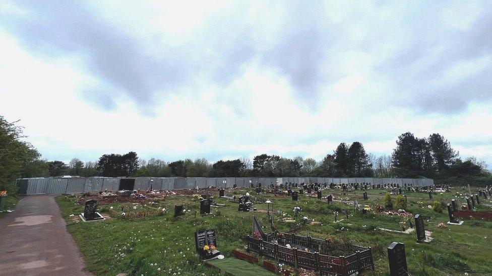 Cemetery with surrounding fences