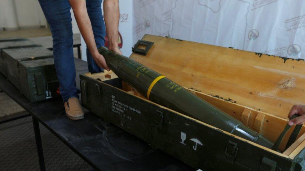 A picture taken in Tripoli on June 29, 2019, shows fighters loyal to the internationally-recognised Libyan Government of National Accord (GNA) displaying precision guided munition, which were reportedly confiscated from forces loyal to General Khalifa Haftar in Gharyan.