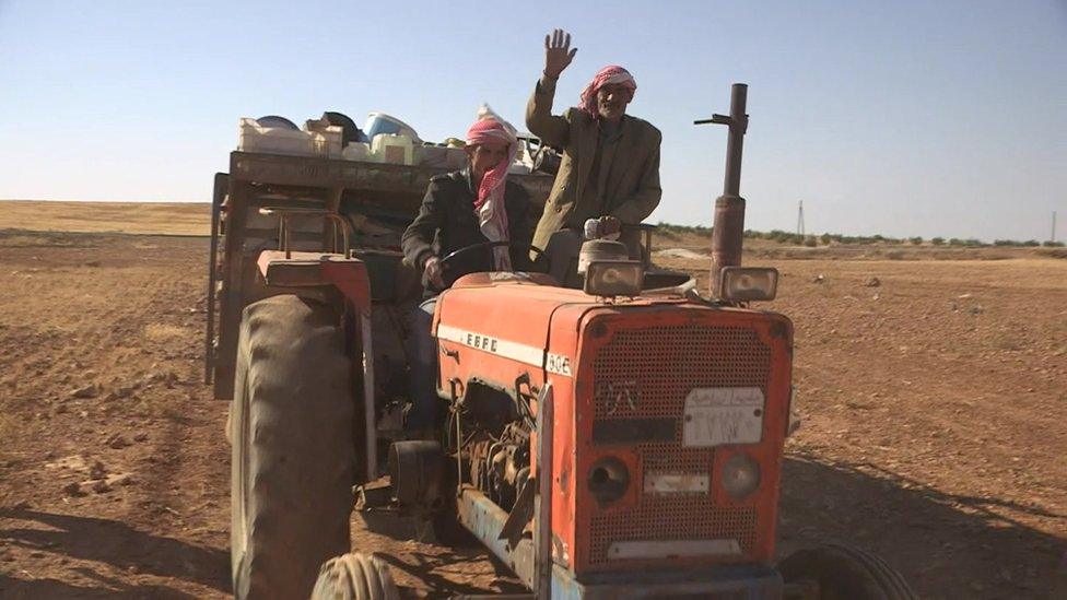 Manbij town residents fleeing on a tractor