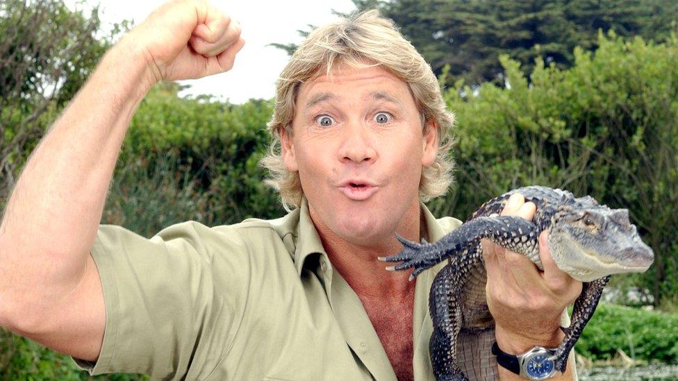 Steve Irwin holding a crocodile