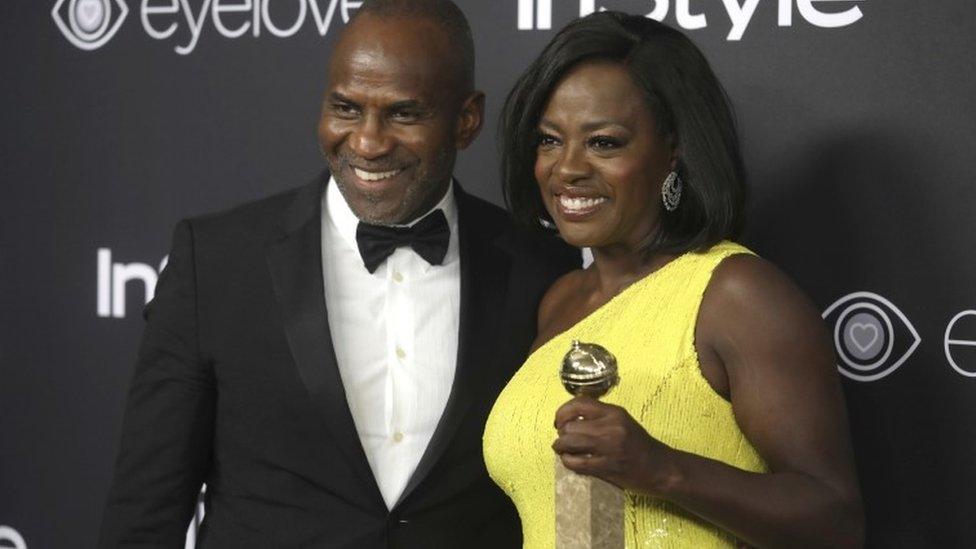 Viola Davis, who won a Golden Globe Award for Best Supporting Actress in the film "Fences" with husband Julius Tennon.