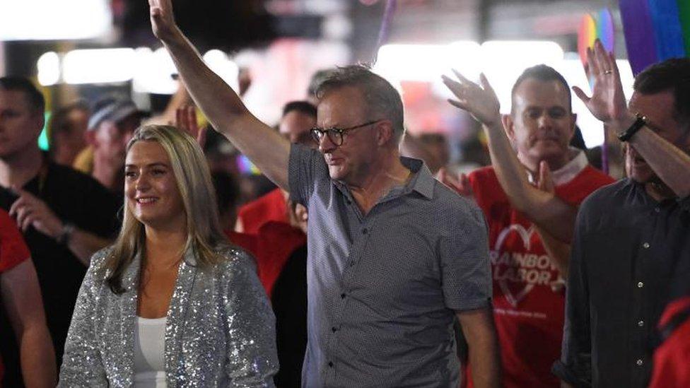 Australia's Prime Minister Anthony Albanese (C) reacts as he attends the 45th annual Gay and Lesbian Mardi Gras parade on Oxford Street in Sydney, Australia, 25 February 2023.