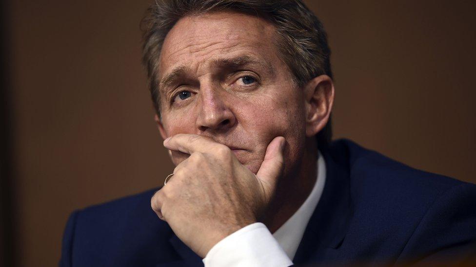 Sen. Jeff Flake(R-AZ) listens during Brett Kavanaugh"s US Senate Judiciary Committee confirmation hearing