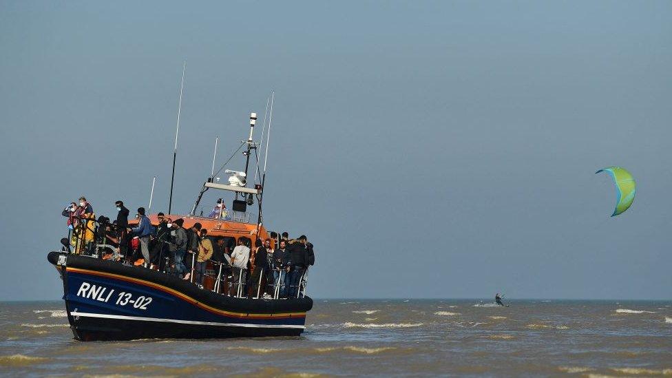 RNLI boat with rescued migrants